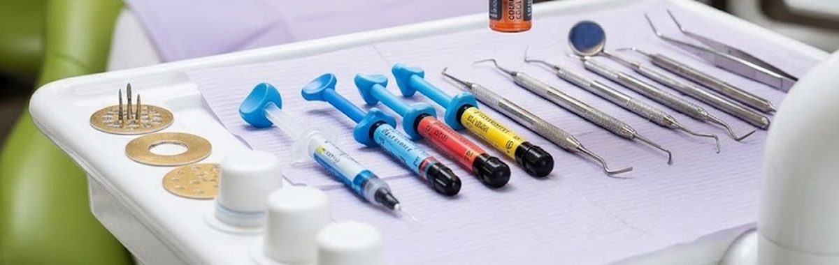 Composite syringes and hand instruments laid out on a tray
